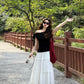 Gentle temperament black off-shoulder T-shirt A-line skirt 2025 two-piece suit R0887