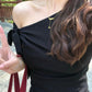 Gentle temperament black off-shoulder T-shirt A-line skirt 2025 two-piece suit R0887