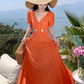Orange V-neck French puff sleeve dress Hot girl hollow waist design high-end seaside holiday dress R0202
