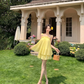 Holiday style beautiful yellow suspender top a-line skirt two-piece suit R0882