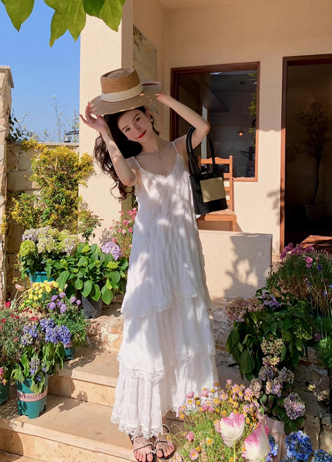 White dress seaside holiday beach dress high-end age-reducing suspender long dress R1700