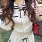 College style doll collar long-sleeved knitted cardigan 2025 contrast color A-line skirt suit R1292