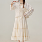Temperament niche apricot sunscreen jacket with suspender skirt cardigan R1925